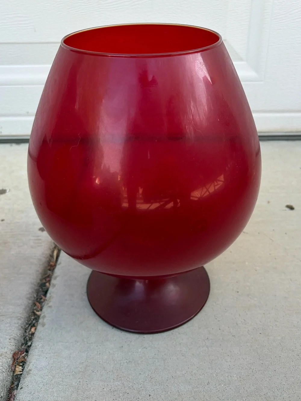 Large red glass snifter